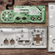 Illustration for article titled Deconstructed Gaming Controllers Reveal Gorgeous Old School Guts